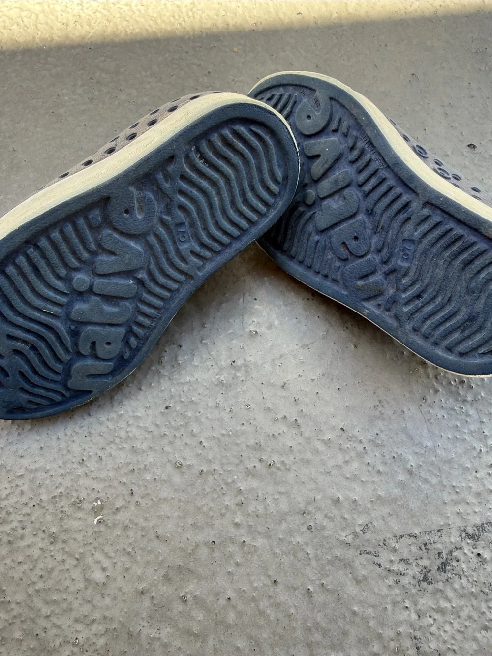Native Navy Slip-On Sneakers with White Toe Cap